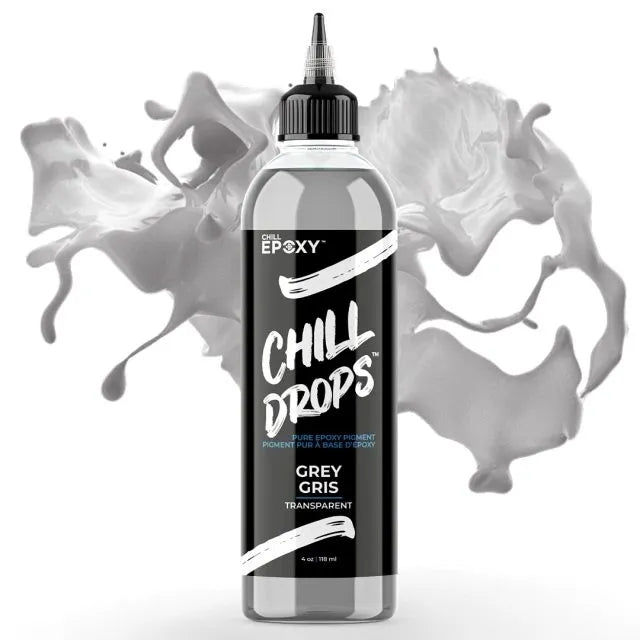 Grå CHILL DROPS epoxy pigmentflaske med prismerende grå epoxy baggrund.