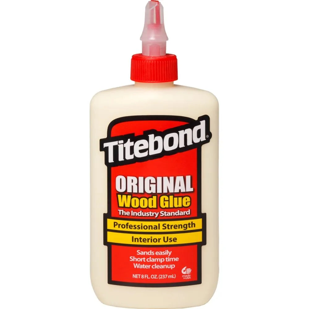 Flaske med Titebond Original trælim, hvid med rød hætte og sort, rød og gul etikette.